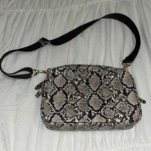 Twelve little snake print diaper luxe bag over the shoulder bag